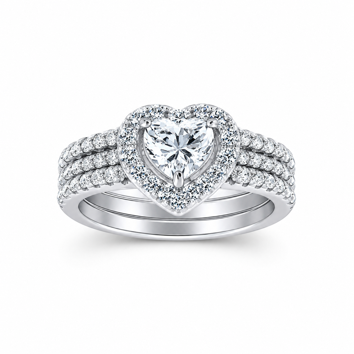 Silver heart shaped diamond ring on a white background