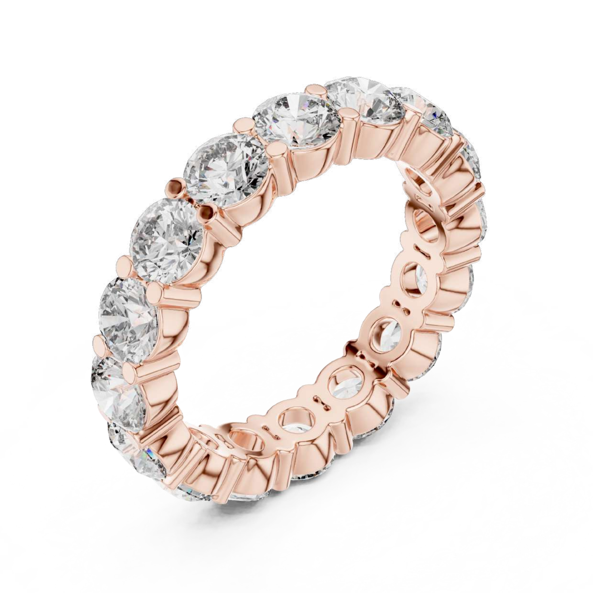 Rose gold ring with clear gemstones on a white background