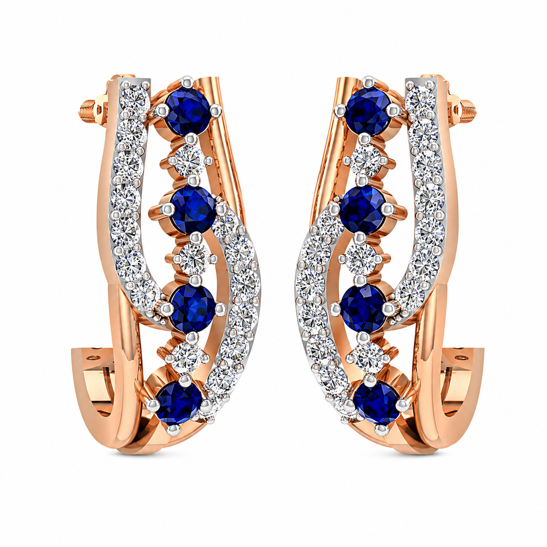 Rose gold hoop earrings with blue gemstones and clear stones on a white background