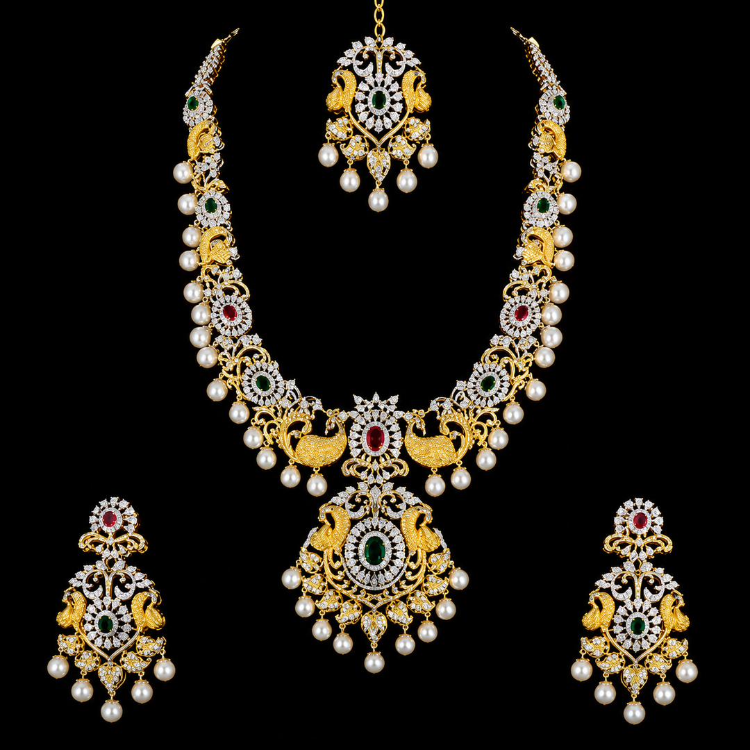 Gold-plated traditional Indian jewelry set featuring a necklace, earrings, and a pendant, embellished with white faux pearls, green and red stones, and peacock motifs, displayed on a solid black background.
