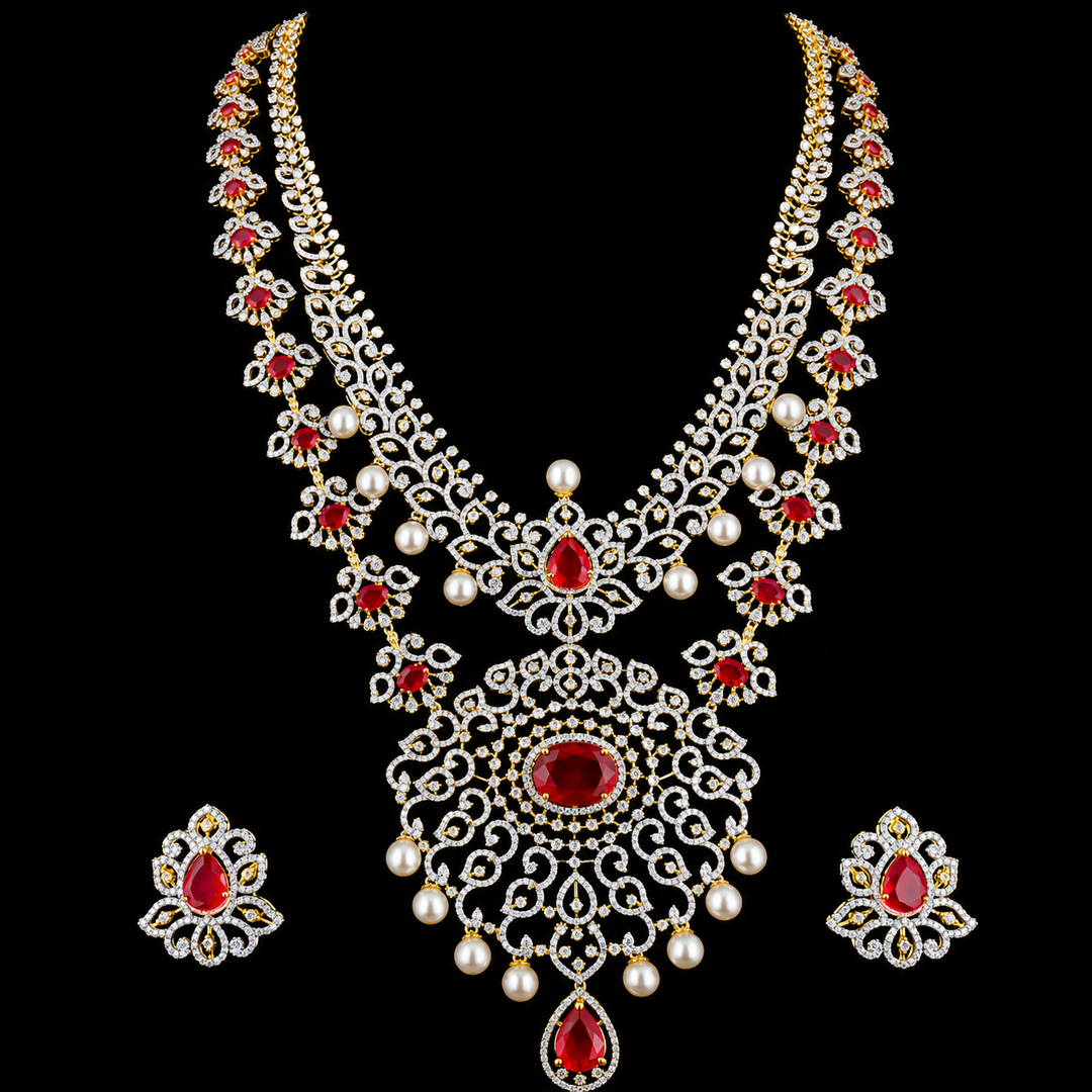 Gold-plated traditional Indian jewelry set featuring a multi-strand necklace and matching earrings, embellished with red stones and white faux pearls, displayed against a solid black background.
