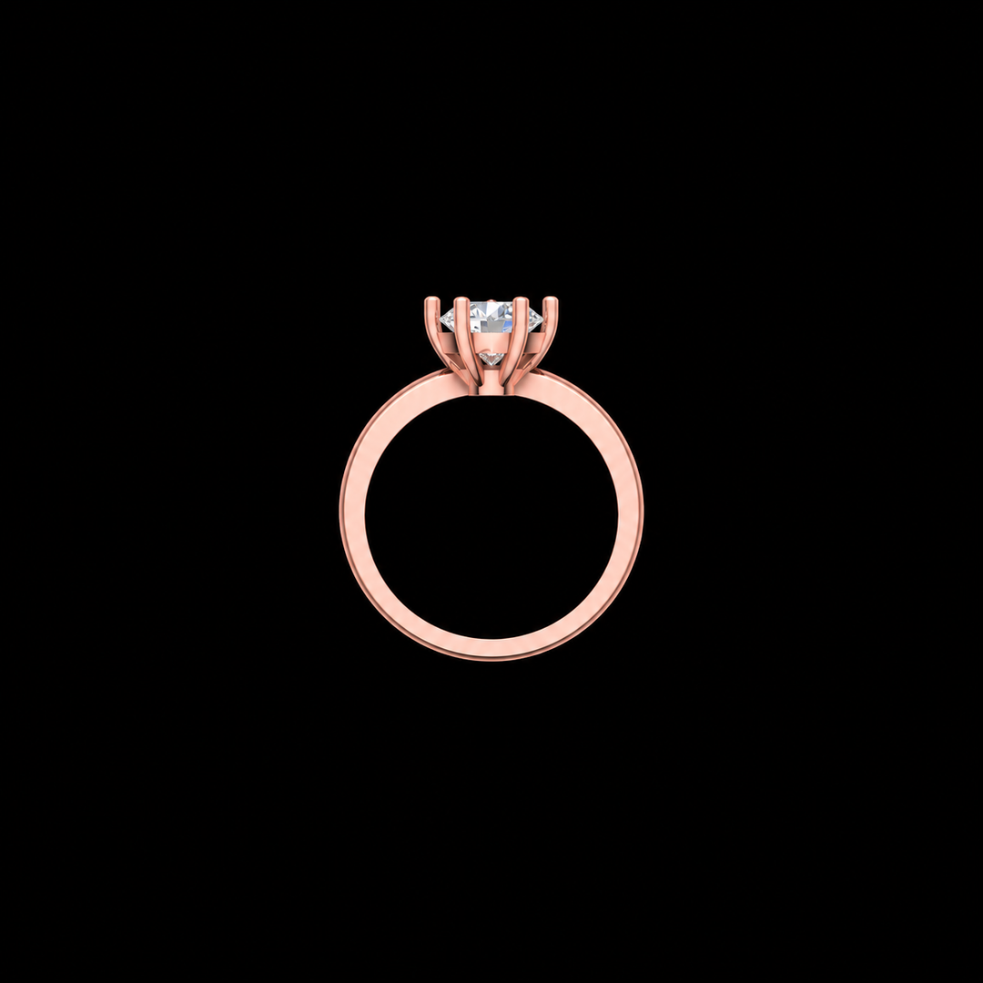 Rose gold ring with a diamond on a black background