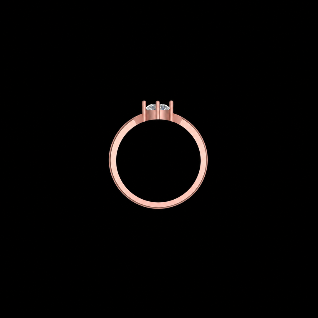 Rose gold ring with a diamond on a black background
