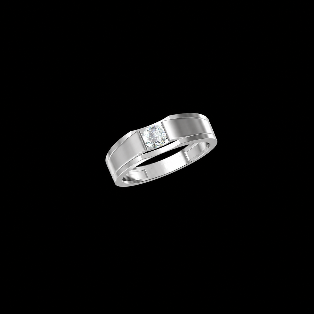 Silver ring with a black gemstone on a white background