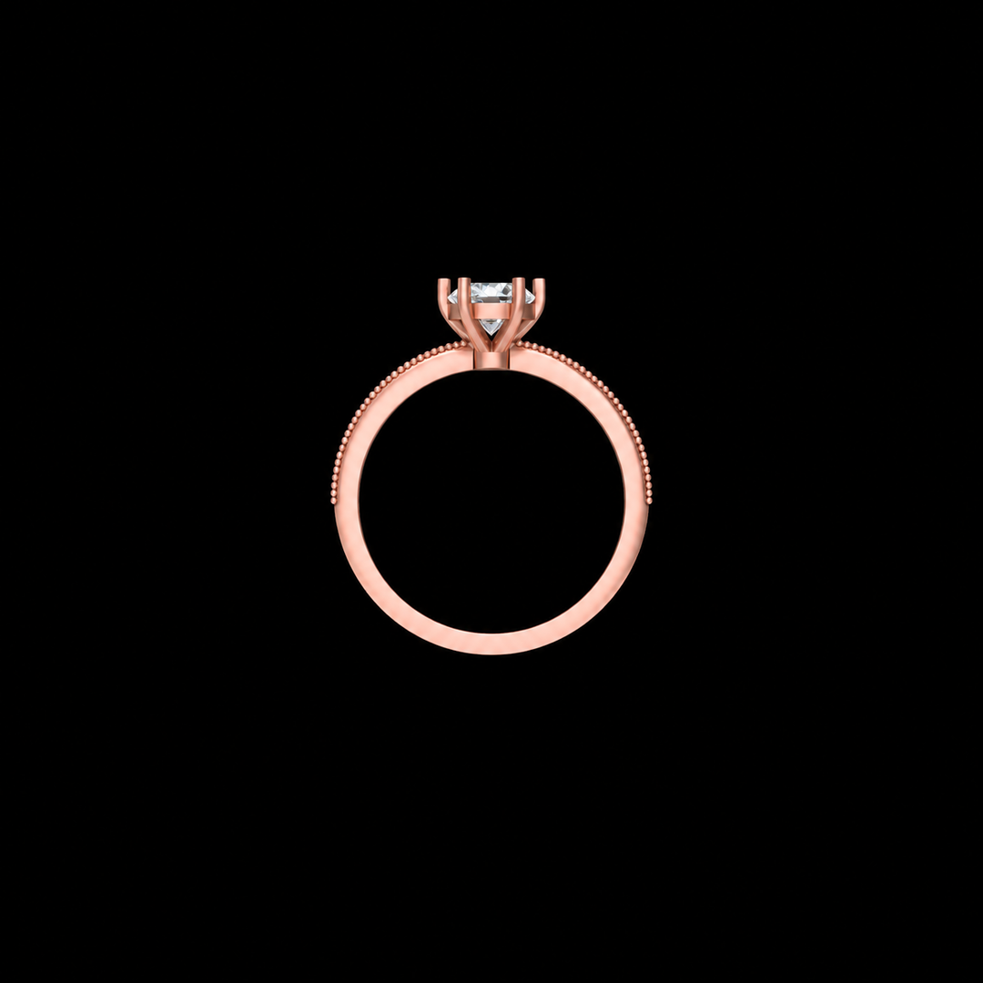 Rose gold ring with a diamond on a black background